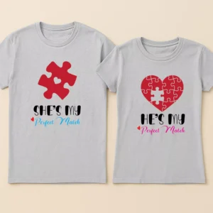 Grey customized perfect match couple t shirts featuring a red puzzle piece and heart graphic with text reading She's My Perfect Match and He's My Perfect Match.