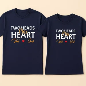 Matching Couple T-Shirts 14 A set of personalized two heads one heart couple t shirts with custom names printed on matching tops.