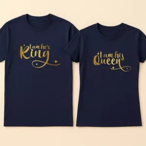 Man and woman wearing matching black romantic king queen couple t shirts standing together.