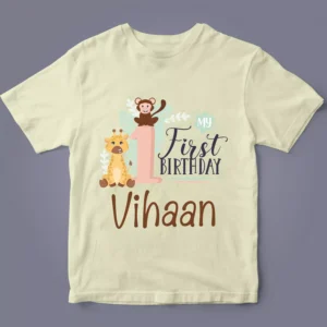 Flatlay of personalised 1st birthday cartoon name T-shirt for boys