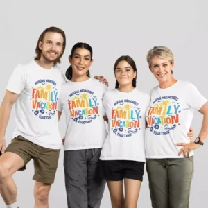 Family wearing personalised matching vacation T-shirts with colorful “Family Vacation” design, perfect for parents and kids on holiday trips.