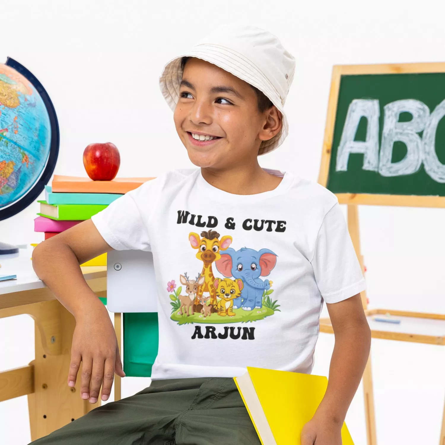 Personalized Kids Name T-Shirt with Cute Jungle Animals | Custom Boy Gift for Birthdays & School Moments 1 Boy wearing a personalized white t-shirt with jungle animal illustration and custom name printed on it